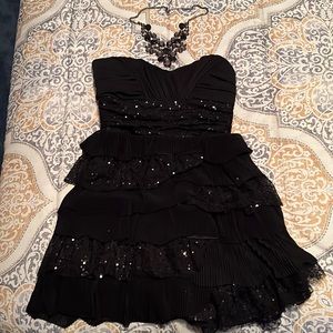 Junior’s homecoming little black dress.